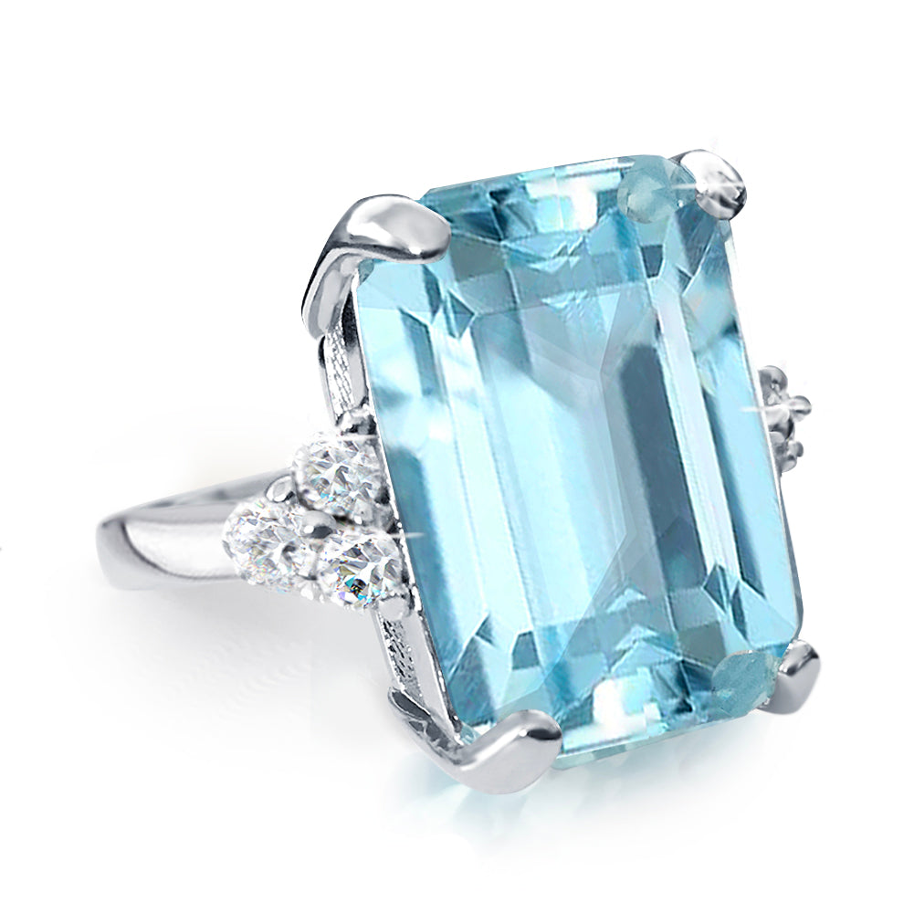 Emerald Cut Blue Cocktail Ring in White Gold Plating