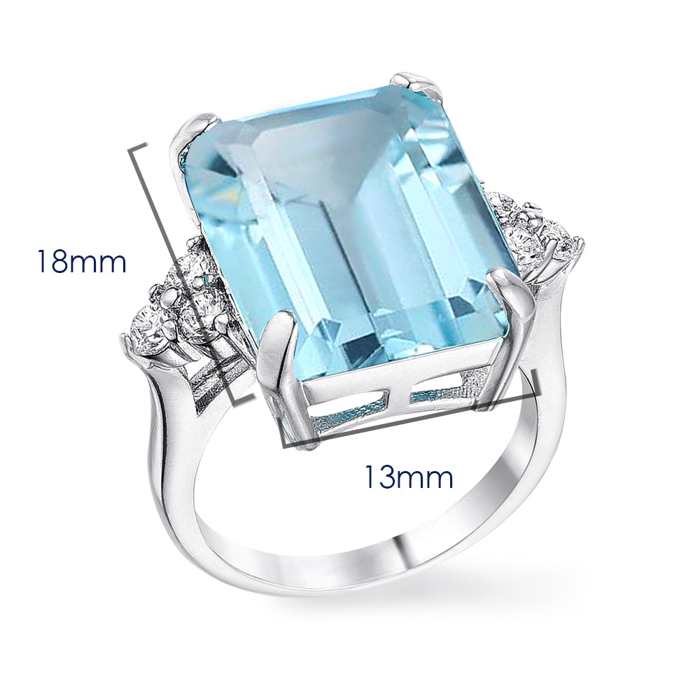 Emerald Cut Blue Cocktail Ring in White Gold Plating