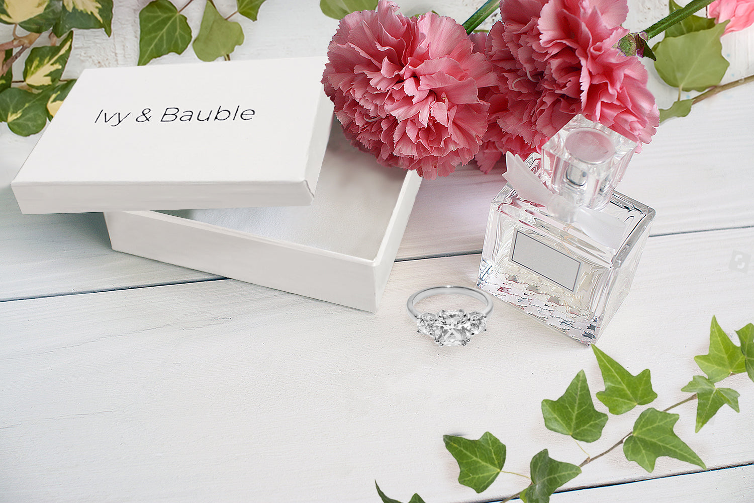 Three Stone CZ Engagement Ring in White Gold Plating